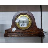 A vintage oak cased mantel timepiece with dIal marked 'Sir. John Bennett' with platform escapement