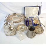 A box containing a quantity of silver plated items including a crust set, cake basket and bon bon