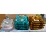 A quantity of 1970's coloured glass ashtrays, etc.