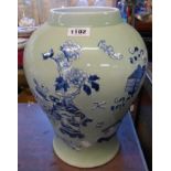 A large 20th Century Chinese porcelain jar with moulded decoration depicting a vase and scholarly