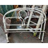 A pair of Victorian cast iron single bed ends with white painted finish