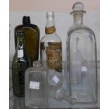 A small selection of old bottles including 19th Century Dutch green gin bottle with seal, old