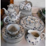 A quantity of Royal Doulton dinner and tea ware in the Yorktown pattern including teapot, coffee