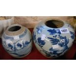 An antique Chinese ginger jar with hand painted decoration depicting an exotic bird amidst foliage -