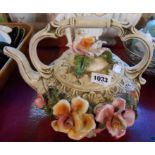 A large Capodimonte tea kettle with large applied floral decoration - a/f