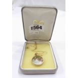 A 375 (9ct.) gold framed open locket with images of rough collie dogs, on fine marked 9ct chain
