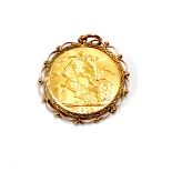 A 1913 gold Sovereign, loose set in a 9ct. gold pendant mount