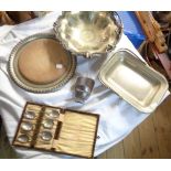A quantity of silver plated items including two back to nickel cake baskets, bread board and cased