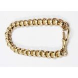 An import marked 375 (9ct.) gold watch chain style bracelet with solid barrel and kerb links with