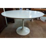 A 1.18m diameter vintage Arkana 'Tulip' pedestal dining table with white finish, set on a waisted
