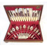 A vintage wood canteen containing a part set of Thomas Turner silver plated cutlery