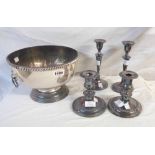 A silver plated punch bowl - sold with two pairs of plated candlesticks