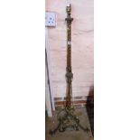 An early 20th Century cast brass standard lamp of column form with acanthus leaf decoration, set