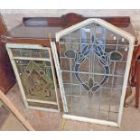 A 71cm old leaded glass window panel with arched white painted frame and central stained glass