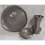 A Liberty Tudric pewter vase of baluster form with beaten finish, a similar Talbot pewter bowl and a