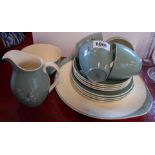 A Royal Doulton part tea set in the Spindrift pattern comprising four trios, milk and sugar and