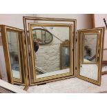 A vintage parcel gilt framed triple dressing table mirror