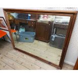 A modern stained wood framed oblong wall mirror - 1.34m X 1.05m