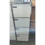 An Escoline locking metal four drawer filing cabinet - with keys
