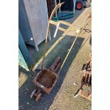 An old cast iron tennis court line marker - marked for Gamages Club, London