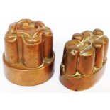 A Victorian copper jelly mould with chain-link decoration to castellated top and stampmark M443 -