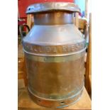 A small copper milk churn and lid - churn marked for Newhall Dairies Ltd., the lid marked Nestle