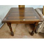 A vintage oak draw-leaf dining table, set on turned legs - 1.8m overall
