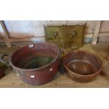 Two copper two handled preserving pans - sold with an old small brass fire front fender