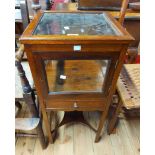 A 36cm Edwardian mahogany table vitrine with door to front and drawer under, set on slender square