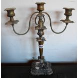 An old silver on copper three branch candelabrum - rubbed