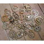 A bag containing a small collection of vintage and antique horse brasses including The Old Post