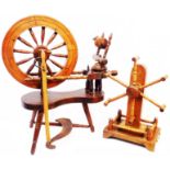 A vintage hardwood spinning wheel - sold with a vintage hardwood wool skein winder