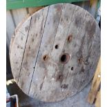 Two old wooden wheels from a cider press