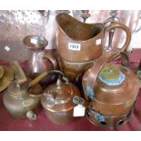 A quantity of assorted metalware including quart measure, copper kettles, spirit kettle, etc.