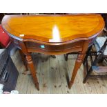 An 82cm reproduction yew wood demi-lune side table with serpentine front and blind frieze drawer,