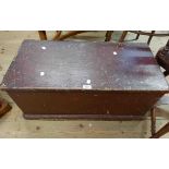 An 80cm Victorian stained pine lift-top box with flanking iron drop handles