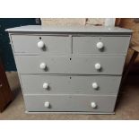 A 1.05m Victorian pine chest of two short and three long graduated drawers, each with white