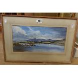 A framed watercolour, depicting a lake scene with buildings and sailing vessels - sold with a gilt
