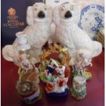 A pair of 19th Century Staffordshire comforter spaniels - sold with a small quantity of figurines
