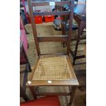 An antique oak framed footstool with upholstered top, set on bun feet - sold with an Edwardian oak