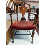 A 19th Century mahogany elbow chair with bowed later upholstered seat - sold with basket weave