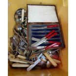 A box containing a quantity of silver plated cased and loose cutlery