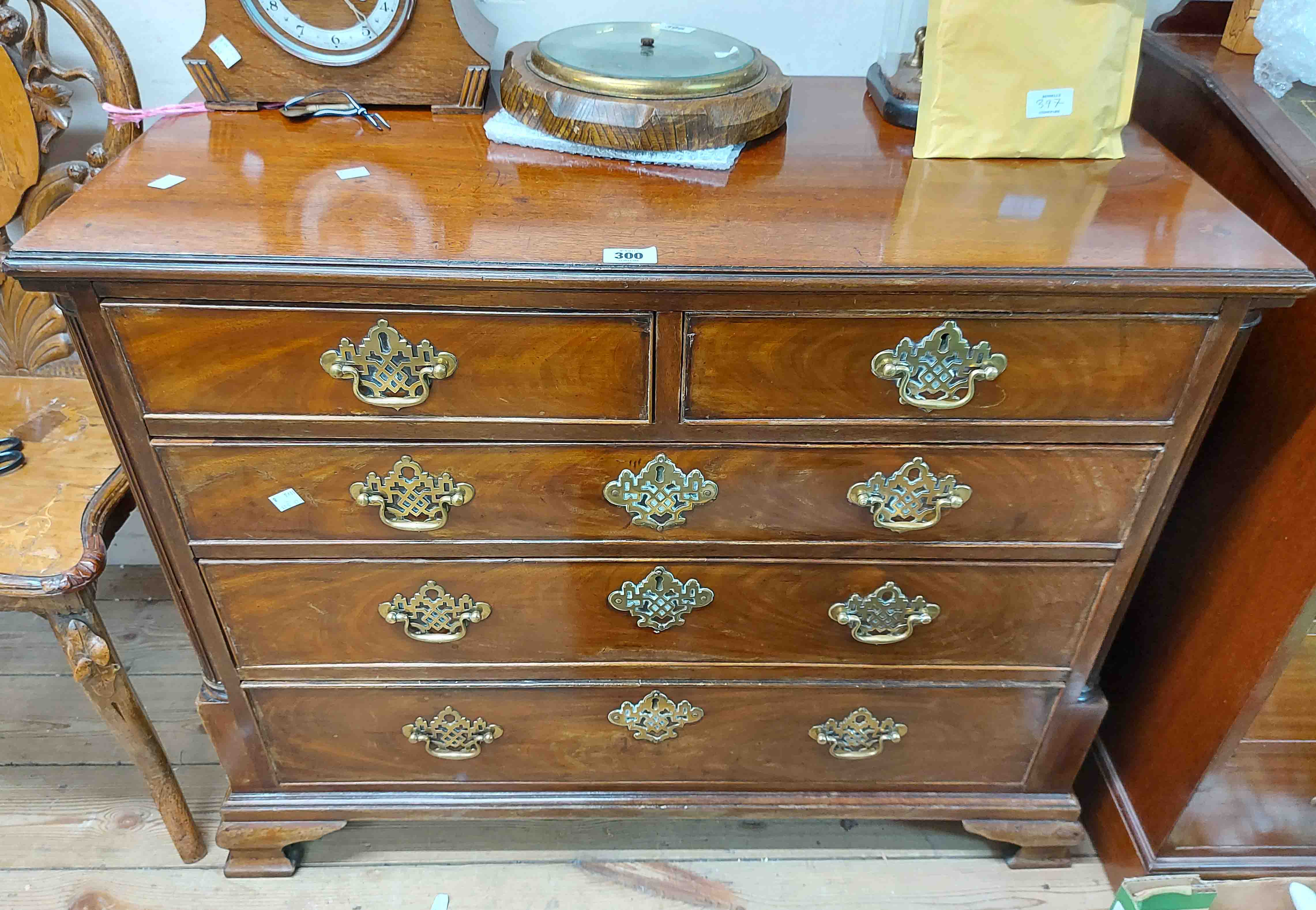 A 92cm late 18th Century mahogany chest of two short and three long graduated drawers with pierced - Image 2 of 3