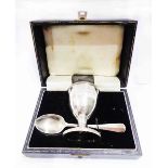 A cased silver egg cup with later presentation text and original spoon - Birmingham 1959