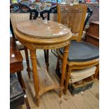 A 56cm 20th Century mixed wood two tier occasional table with marble top, set on fluted turned