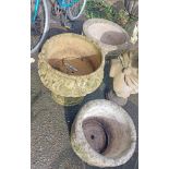 Two similar concrete garden planters, set on pedestal bases - sold with another similar planter