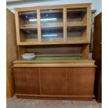 A 1.72m vintage oak two part shop display cabinet with flanking glass doors to top, glazed lift-