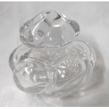 An early 20th Century small Baccarat crystal perfume bottle with moulded and cut decoration and acid