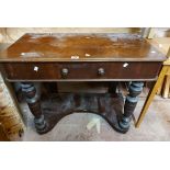 An 89cm late Victorian mahogany duchess dressing table base with frieze drawer, flanking turned