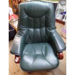 A Stressless reclining easy with green leather upholstery, bentwood supports and swivel base -